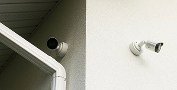 A few home security cameras placed to reduce blind spots