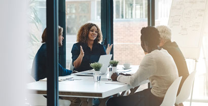 Window tinting on commercial window improving workers' comfort and productivity in Tucson