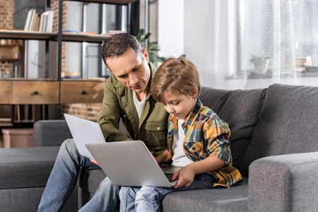 Father and son enjoining a Wireless installation at home in Tucson