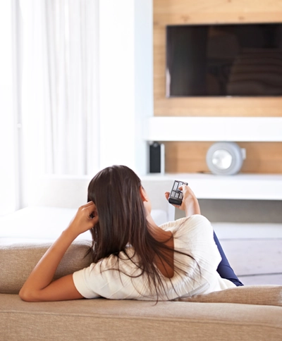 Woman enjoyning a home audio video installation in Tucson_1 Woman enjoyning a home audio video installation in Tucson